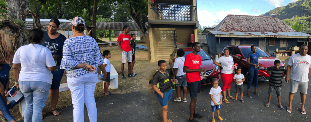 A collage of community visits from ELMI’s outreach archive
